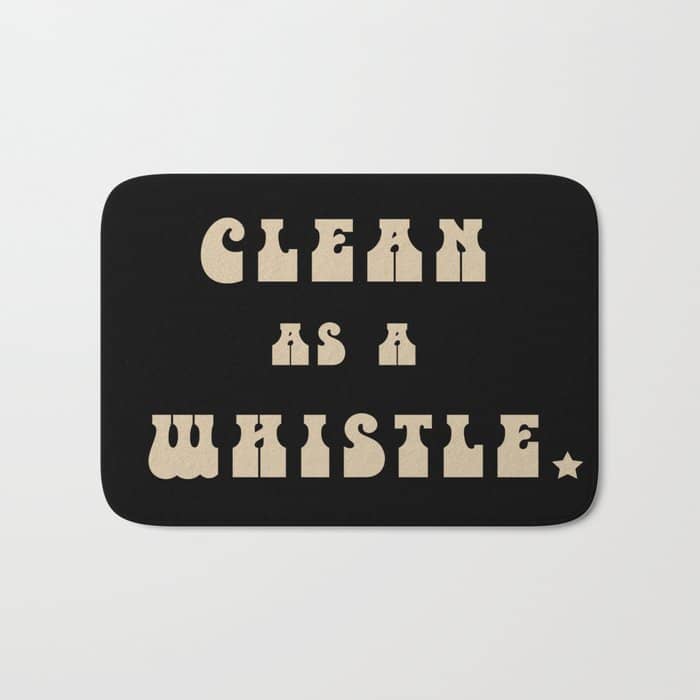 Clean As A Whistle In Black And Cream Bath Mat