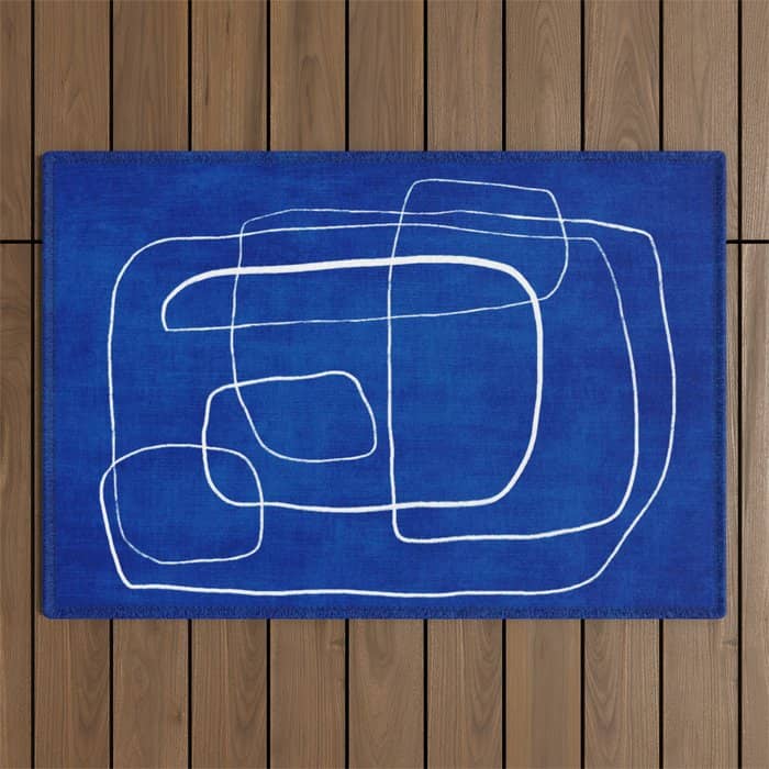White Line Art Cobalt Blue Background Neon Look Outdoor Rug