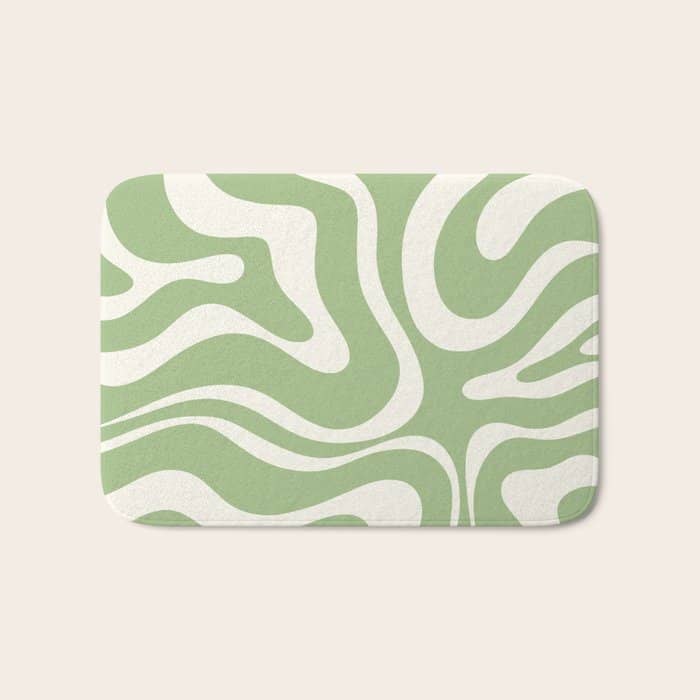 Modern Liquid Swirl Abstract Pattern In Light Sage Green And Cream Bath Mat