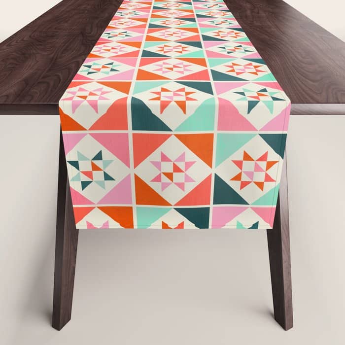 Festive Quilt Pattern In Pink, Red And Green Table Runner