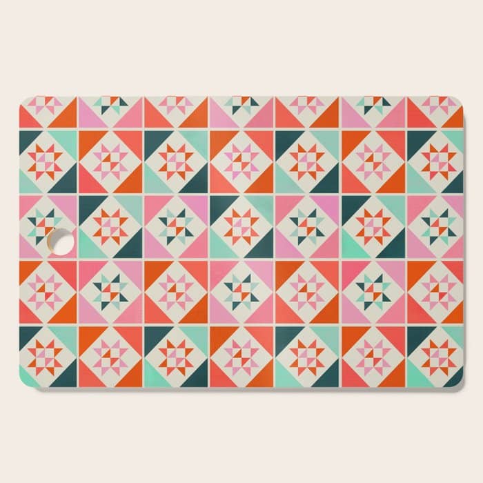Festive Quilt Pattern In Pink, Red And Green Cutting Board