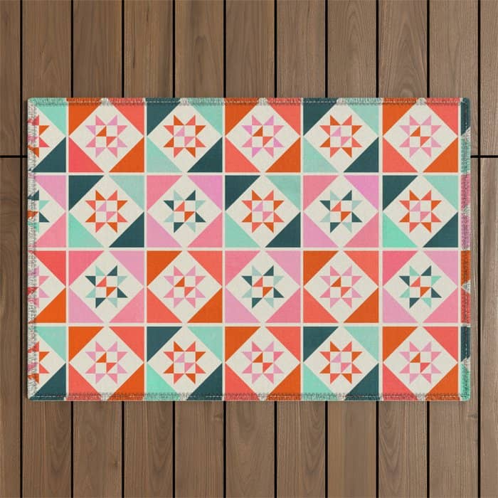 Festive Quilt Pattern In Pink, Red And Green Outdoor Rug