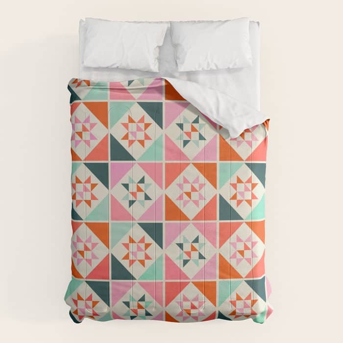 Festive Quilt Pattern In Pink, Red And Green Comforter