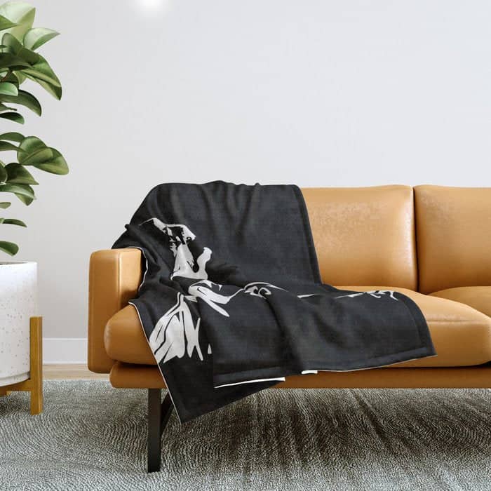 Rocky Mountain Snowboarder Catching Air Throw Blanket