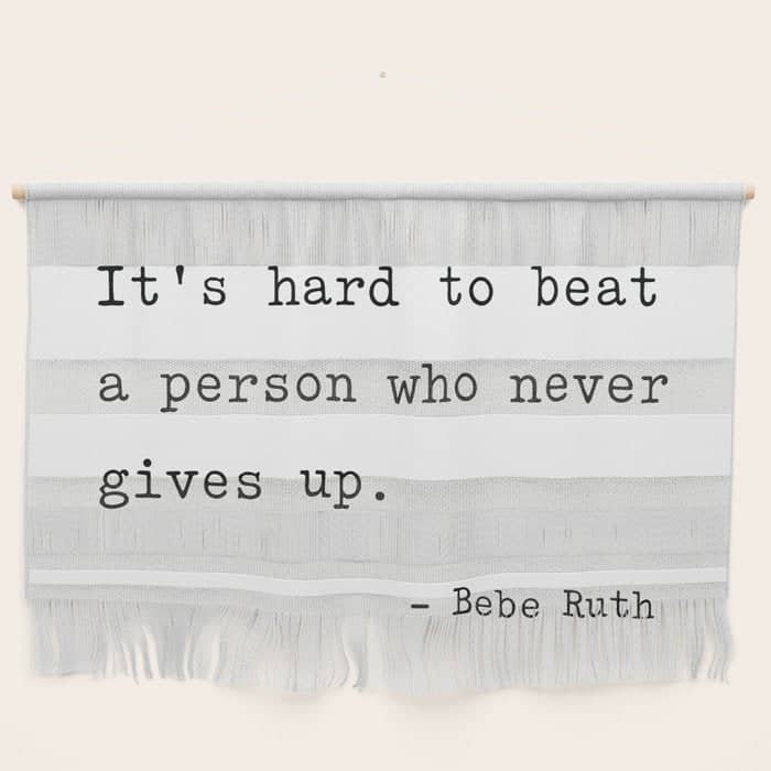 It Is Hard To Beat A Person Who Never Gives Up Wall Hanging