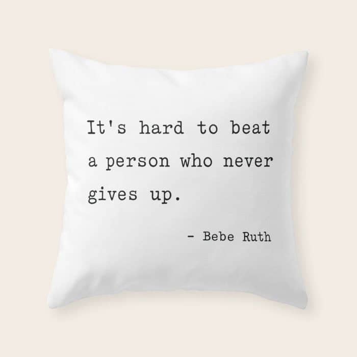It Is Hard To Beat A Person Who Never Gives Up Throw Pillow