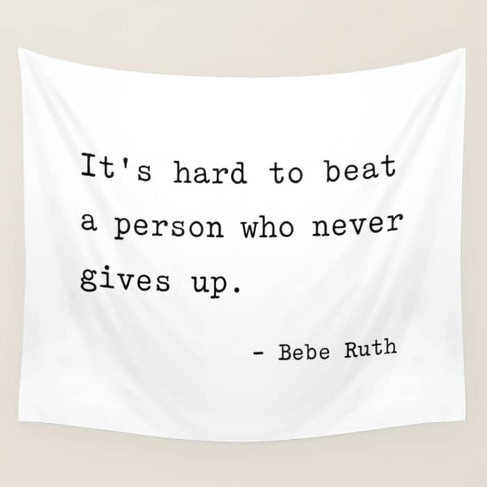 It Is Hard To Beat A Person Who Never Gives Up Wall Tapestry