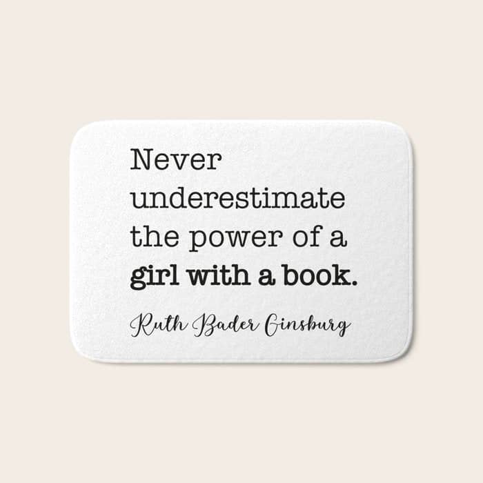 Never Underestimate The Power Of A Girl With A Book. Bath Mat
