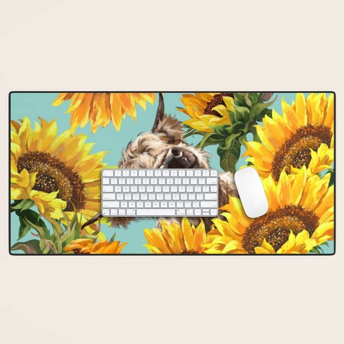 Highland Cow With Sunflowers In Blue Desk Mat