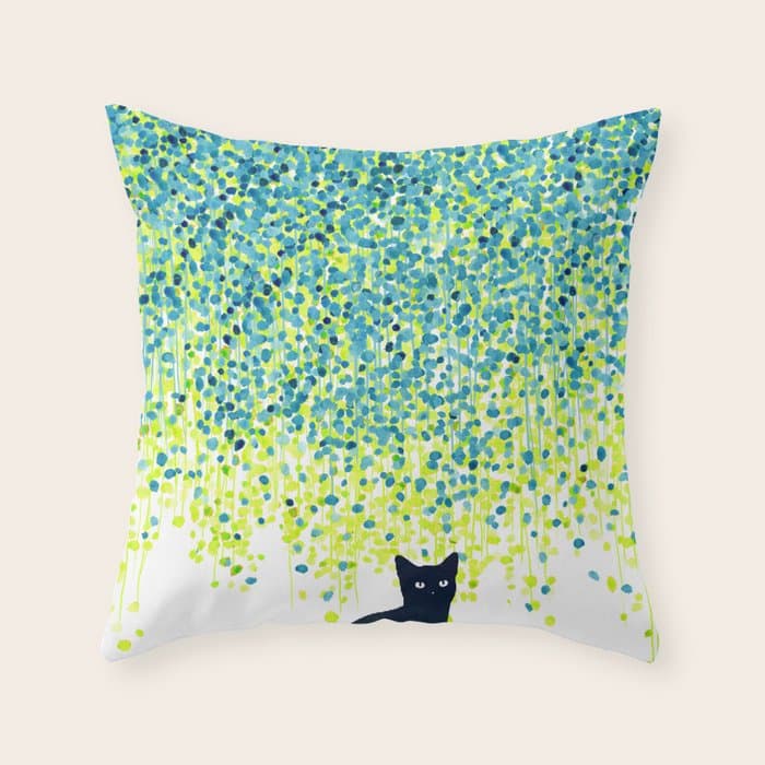Cat in the garden under willow tree Throw Pillow