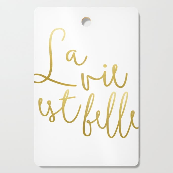 La vie est belle #HomeStorie #typography #buyart Cutting Board