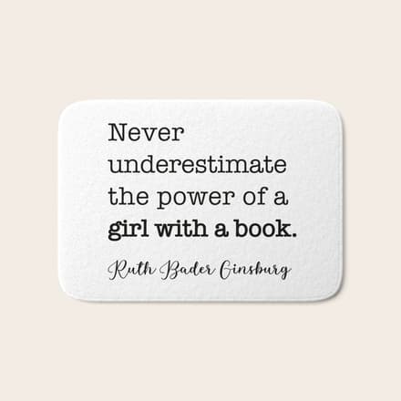 Never Underestimate The Power Of A Girl With A Book. Bath Mat
