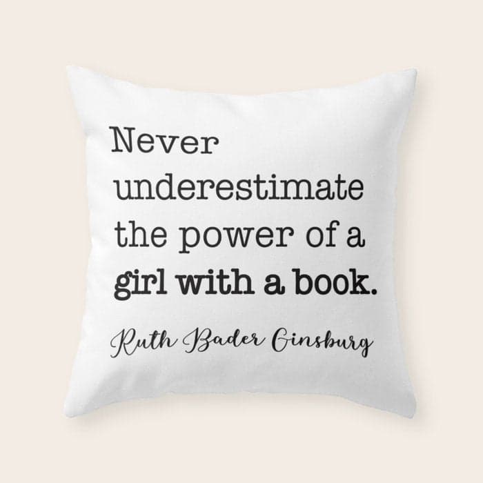 Never underestimate the power of a girl with a book. Throw Pillow