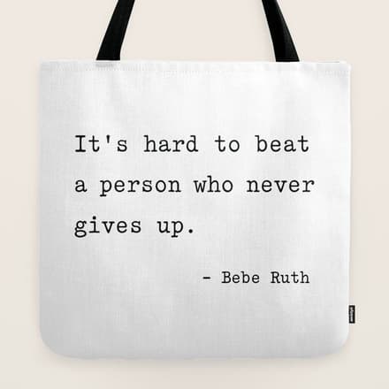It Is Hard To Beat A Person Who Never Gives Up Tote Bag