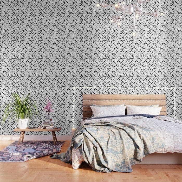 Black geometrical hand painted polka dots confetti pattern Wallpaper