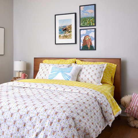 Layered bedding and home decor for anniversaries